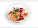 Ziegenkäse im Parmaschinken gegrillt mit Preiselbeeren